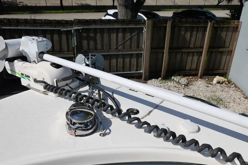 Slide: The Image of 2023 Robalo R242 Explorer boat deck with anchor and equipment. - 15