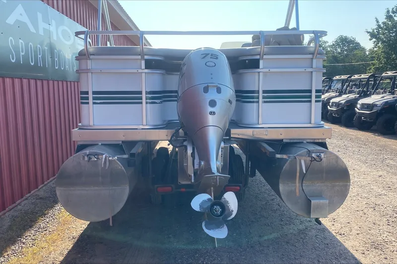 Slide: The Image of Rear view of a 2007 TMC 2200LE pontoon boat with outboard motor. - 9