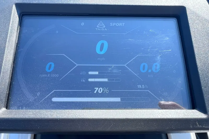 Slide: The Image of Dashboard display of 2024 Taiga Orca showing speed, battery, and power metrics. - 16