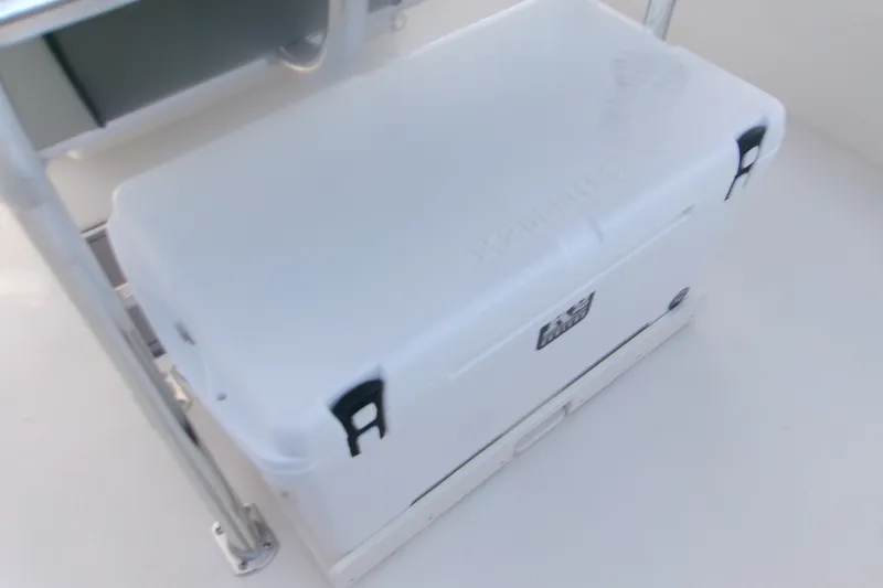 Slide: The Image of White cooler on a 2027 Key West 219 FS boat deck. - 17