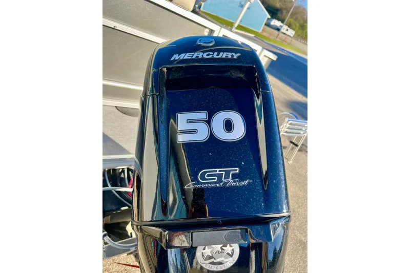 Slide: The Image of Mercury 50 HP outboard motor on 2021 Starcraft EX 20 C boat. - 31