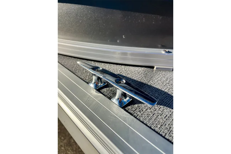Slide: The Image of Chrome cleat on 2021 Starcraft EX 20 C boat deck, close-up view. - 35