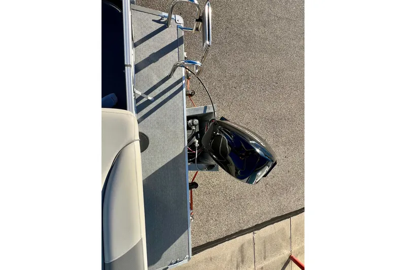 Slide: The Image of 2021 Starcraft EX 20 C boat with outboard motor, viewed from above. - 72