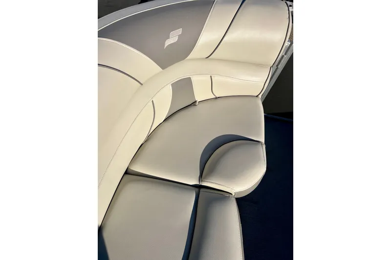 Slide: The Image of Luxurious seating on 2021 Starcraft EX 20 C boat, featuring elegant white upholstery. - 38