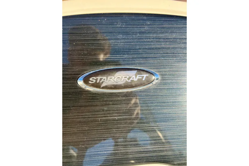 Slide: The Image of Starcraft EX 20 C 2021 logo on a reflective surface. - 57