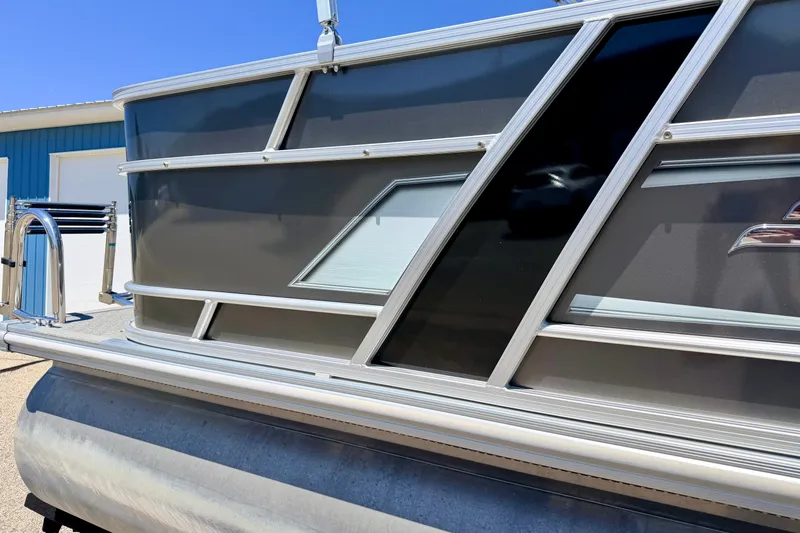 Slide: The Image of 2021 Starcraft EX 20 C pontoon boat with sleek aluminum siding. - 15