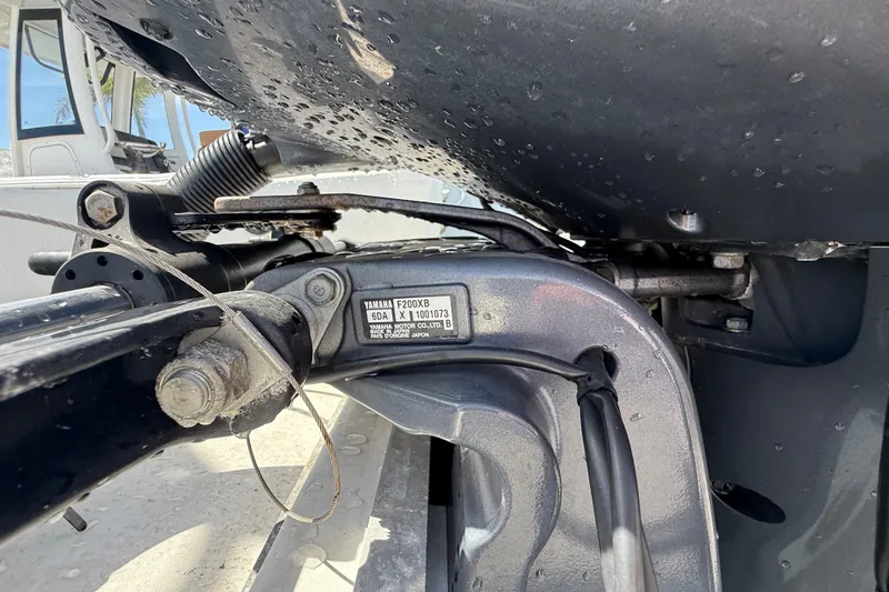Slide: The Image of Close-up of a Yamaha F200XB engine part on a 2013 Sportsman Masters 227 Bay Boat. - 37