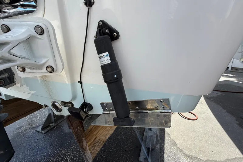 Slide: The Image of 2013 Sportsman Masters 227 Bay Boat transom with trim tab and actuator detail. - 36