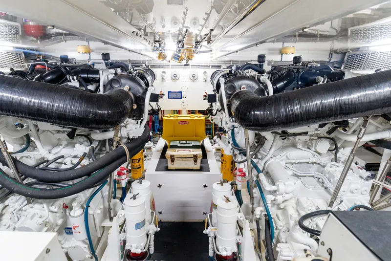 Slide: The Image of Engine room of 2008 Hatteras 64 Motor Yacht with dual engines and mechanical systems. - 26