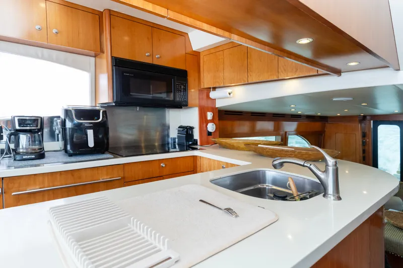 Slide: The Image of Luxurious kitchen interior of 2008 Hatteras 64 Motor Yacht with modern appliances. - 8