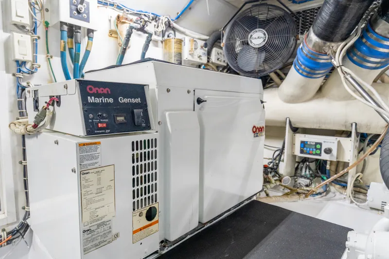 Slide: The Image of Engine room of 2008 Hatteras 64 Motor Yacht with Onan Marine Genset. - 35
