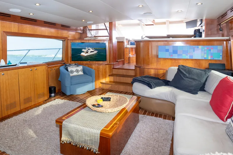 Slide: The Image of Luxurious interior of 2008 Hatteras 64 Motor Yacht with elegant seating and decor. - 3