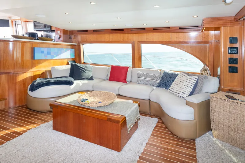 Slide: The Image of Luxurious interior of 2008 Hatteras 64 Motor Yacht with plush seating and ocean view. - 1