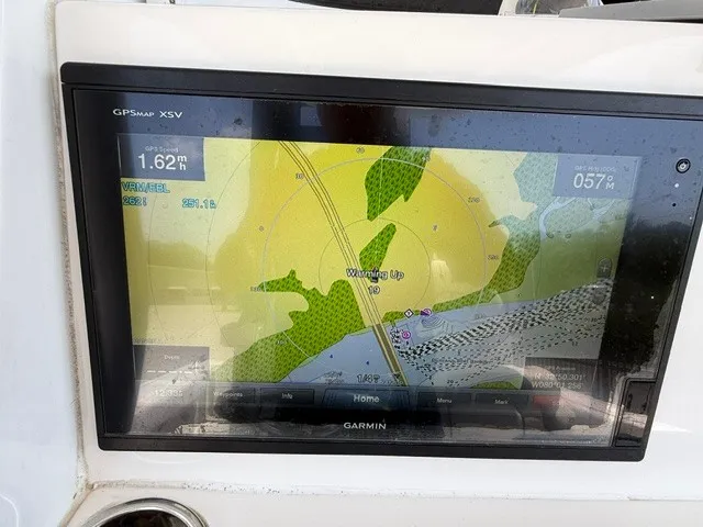 Slide: The Image of A Garmin GPS display on a boat shows a navigation map with depth information. - 19