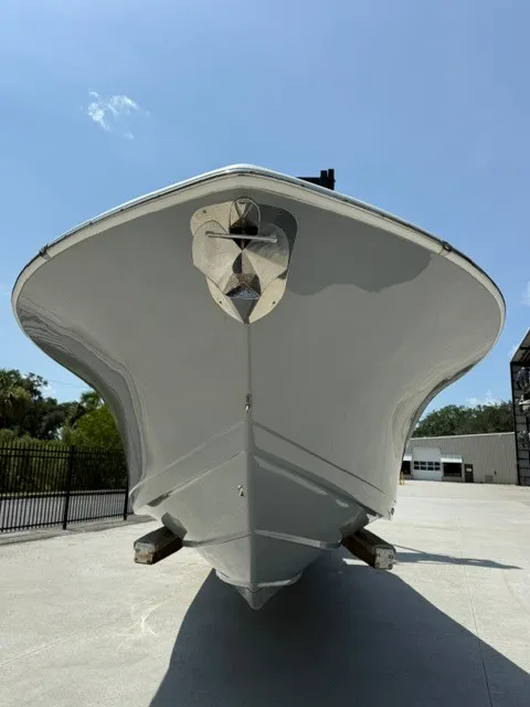 Slide: The Image of The 2018 Tidewater 280 CC Adventure displays its sleek bow on a sunny lot. - 3