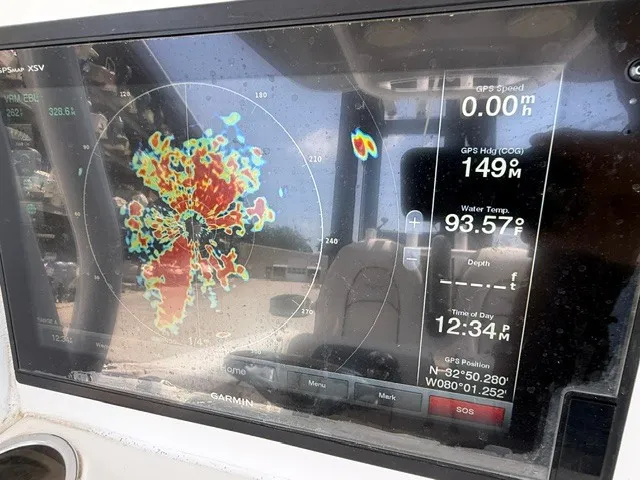 Slide: The Image of A Garmin navigation system displays radar data and GPS information on a boat. - 20