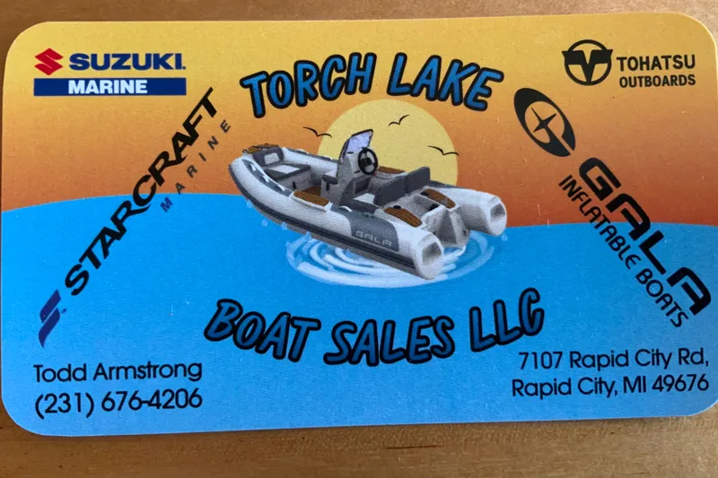 Slide: The Image of Business card for Torch Lake Boat Sales LLC featuring Starcraft Storm 166 DC Pro, 2026 model. - 12