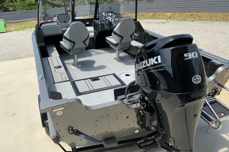 The Image of 2026 Starcraft Storm 166 DC Pro boat with Suzuki 90 outboard motor, featuring dual seating. - 1