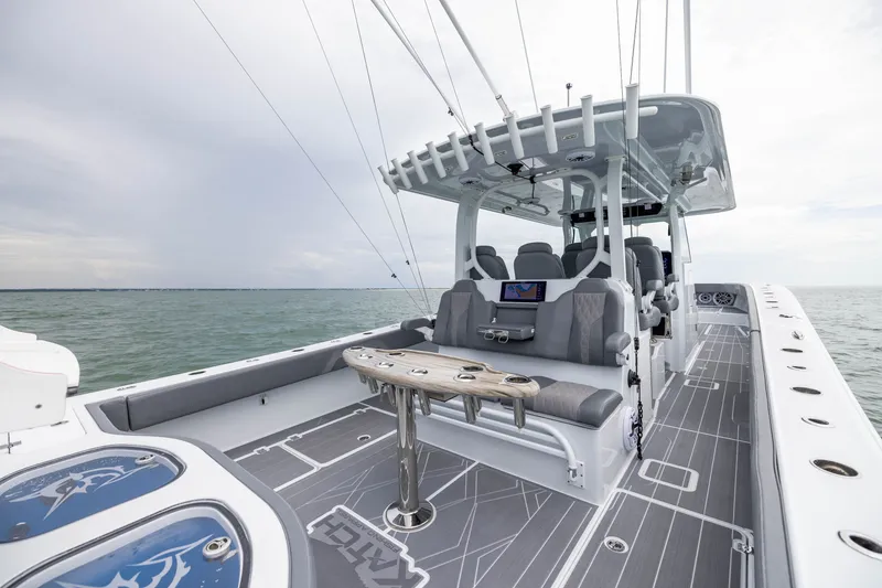Slide: The Image of 2026 Freeman 42LR boat interior with seating and fishing equipment on open water. - 40