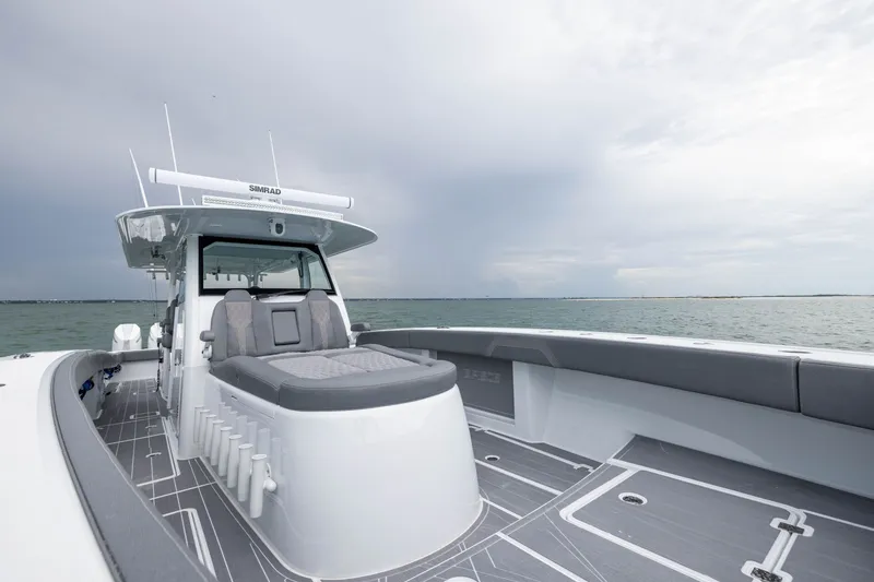 Slide: The Image of 2026 Freeman 42LR boat on open water, featuring sleek design and modern amenities. - 21