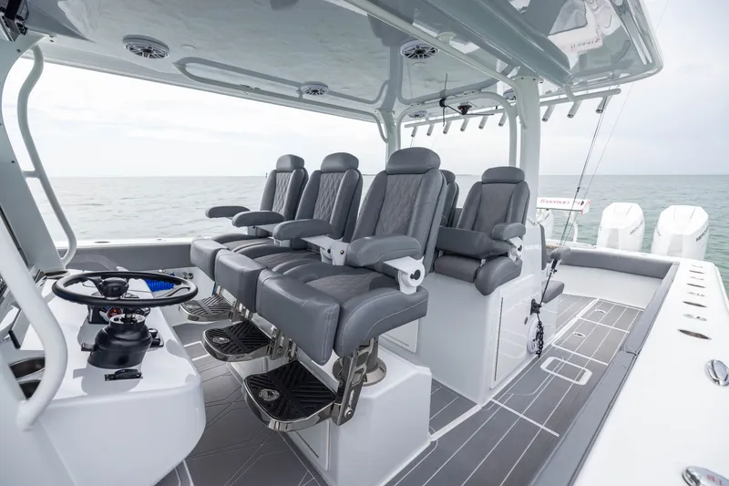 Slide: The Image of Luxurious seating on 2026 Freeman 42LR boat with ocean backdrop. - 30