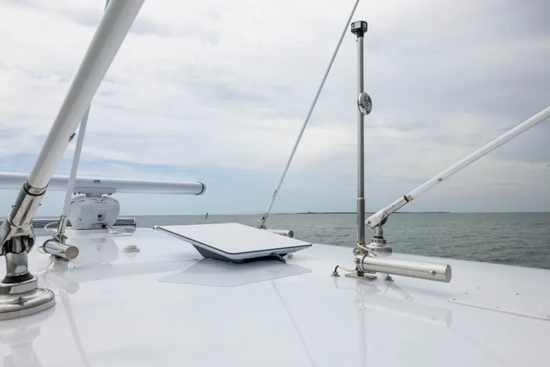 Slide: The Image of Rooftop view of Freeman 42LR boat, 2026 model, with marine equipment and ocean backdrop. - 24