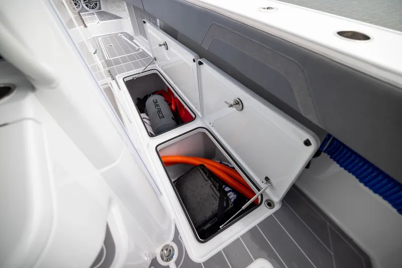 Slide: The Image of Storage compartments on a 2026 Freeman 42LR boat, featuring organized equipment and accessories. - 39