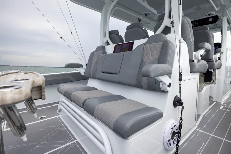Slide: The Image of Luxurious seating on a 2026 Freeman 42LR boat, featuring modern design and ocean backdrop. - 43