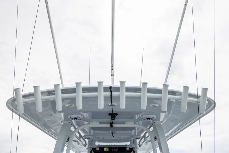 Slide: The Image of Top view of Freeman 42LR boat's structure, showcasing rod holders and antennas, 2026 model. - 42