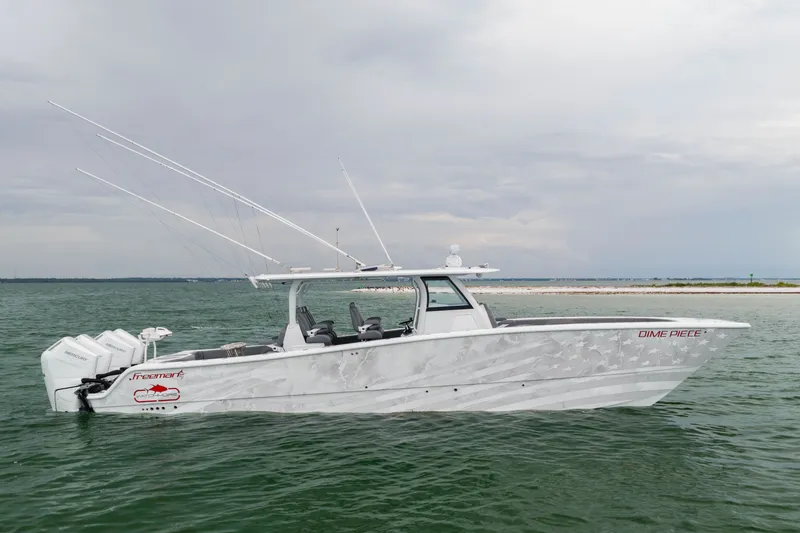 The Image of Freeman 42LR 2026 boat on water, featuring sleek design and powerful engines. - 1