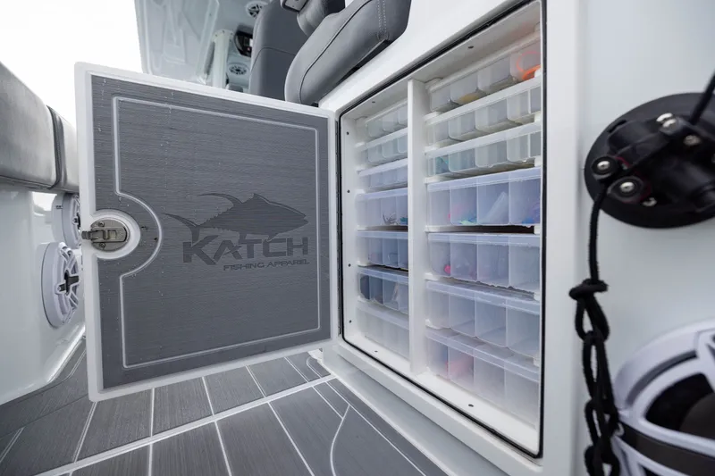 Slide: The Image of Fishing tackle storage on Freeman 42LR boat, 2026 model, with organized compartments. - 47