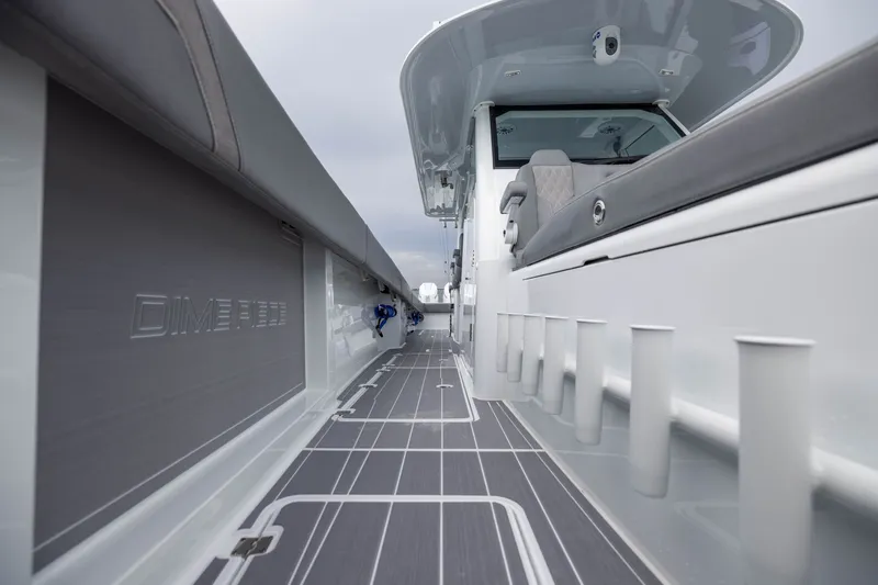 Slide: The Image of Sleek interior of 2026 Freeman 42LR boat with modern design and rod holders. - 28