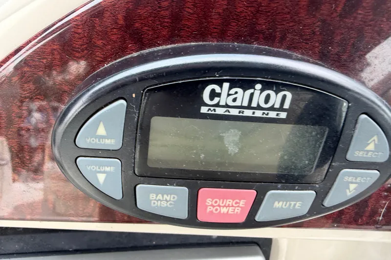 Slide: The Image of Clarion Marine audio system on 2005 Sea Ray Sundancer 260 boat dashboard. - 19