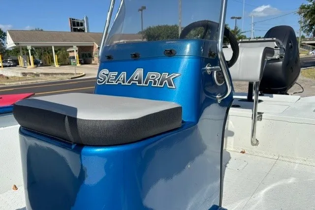 Slide: The Image of 2026 Sea Ark 19 Shadow CC boat with blue console and seating. - 9