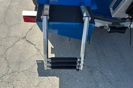 Slide: The Image of Boat ladder on a 2026 Sea Ark 19 Shadow CC, parked on concrete. - 5