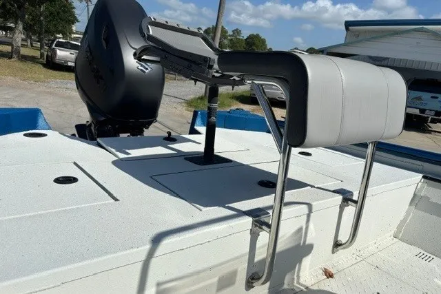 Slide: The Image of 2026 Sea Ark 19 Shadow CC boat with Suzuki outboard motor and cushioned seating. - 7