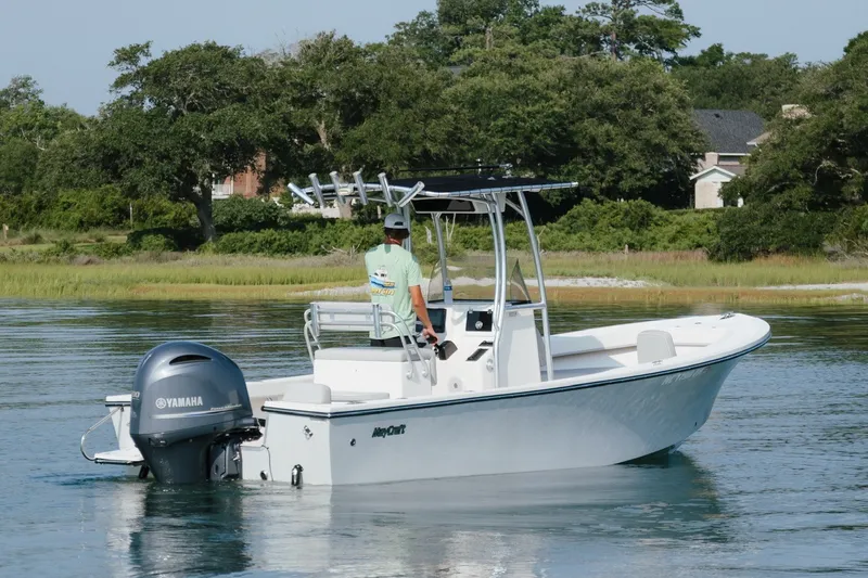 Slide: The Image of 2023 May-Craft 2300 CCX boat with Yamaha engine on calm water. - 11