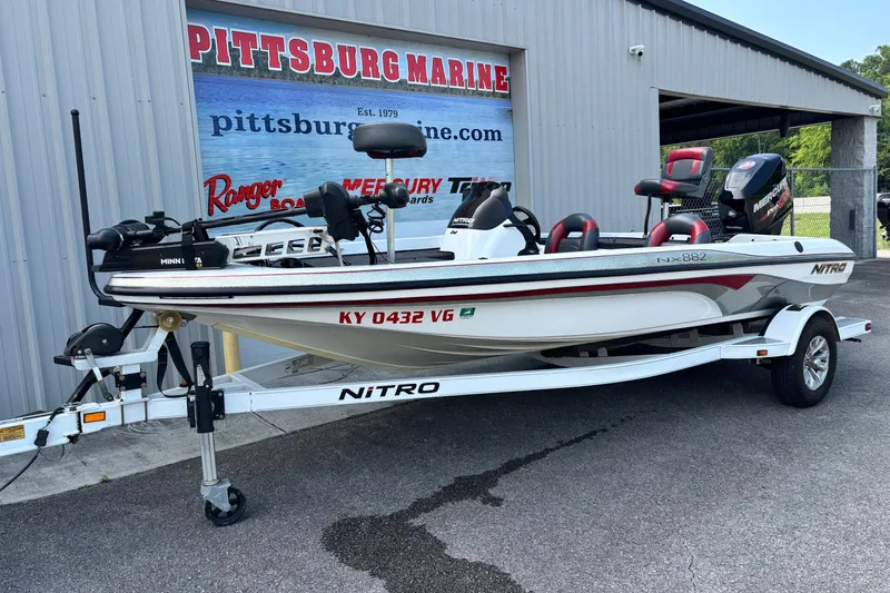 Slide: The Image of 2004 Nitro NX 882 SC fishing boat on trailer at Pittsburg Marine dealership. - 1