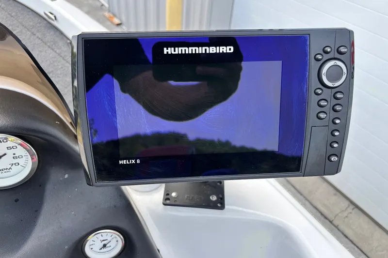 Slide: The Image of Humminbird Helix 8 fish finder on 2004 Nitro NX 882 SC boat dashboard. - 12
