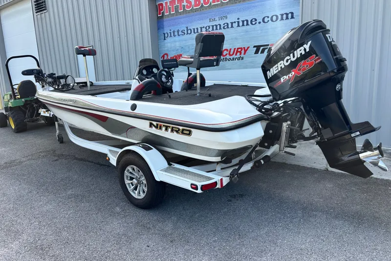Slide: The Image of 2004 Nitro NX 882 SC boat with Mercury Pro XS engine on trailer. - 19