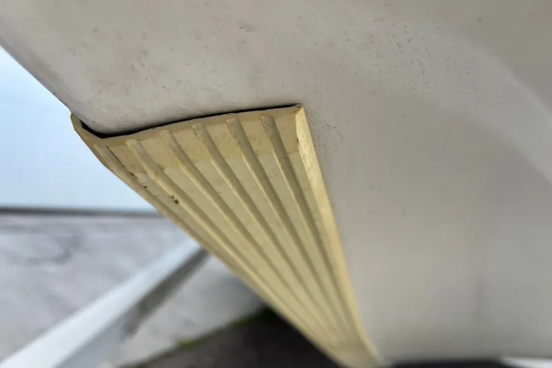 Slide: The Image of Close-up of a 2004 Nitro NX 882 SC boat hull with protective keel guard. - 2
