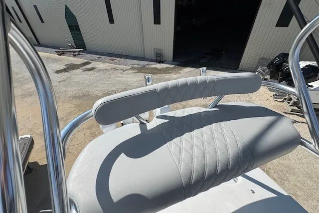 Slide: The Image of 2020 Front Runner 39 Center Console boat with cushioned seating and stainless steel railings. - 29