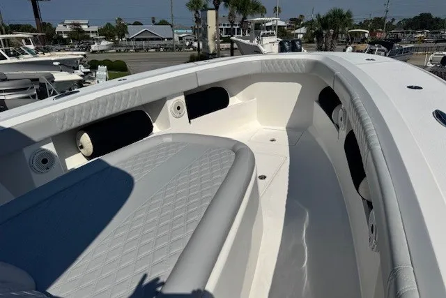Slide: The Image of 2020 Front Runner 39 Center Console boat interior with cushioned seating and sleek design. - 7