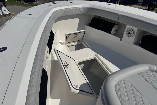 Slide: The Image of 2020 Front Runner 39 Center Console boat interior with open storage compartments. - 8
