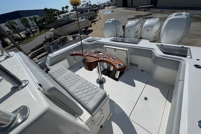 Slide: The Image of 2020 Front Runner 39 Center Console boat with seating and multiple outboard engines. - 13