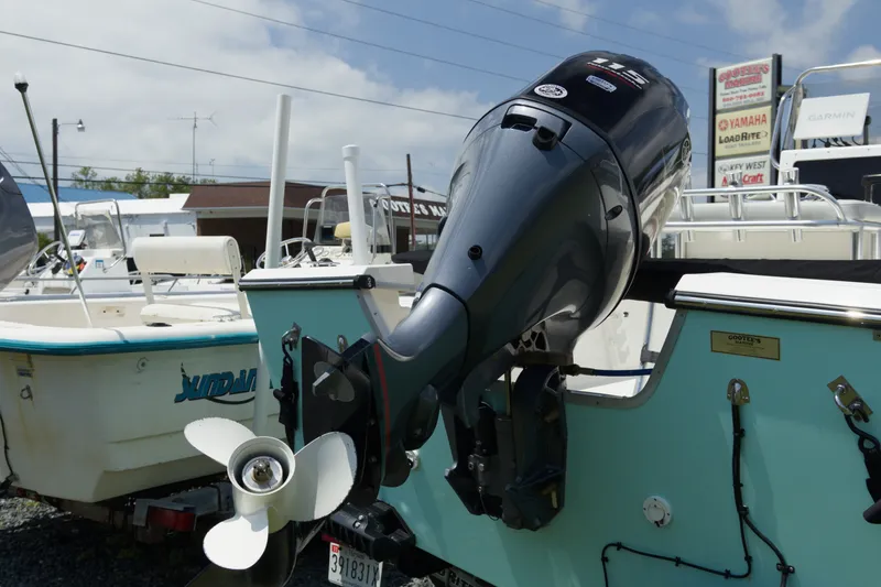 Slide: The Image of 2023 May-Craft 1900CC boat with Yamaha outboard motor in a dealership lot. - 4