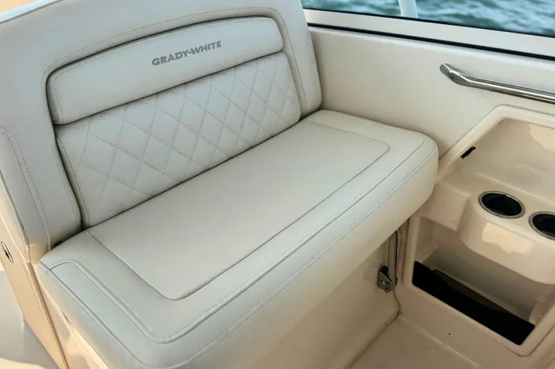 Slide: The Image of 2023 Grady-White Freedom 285 boat seat with cup holders and quilted upholstery. - 32