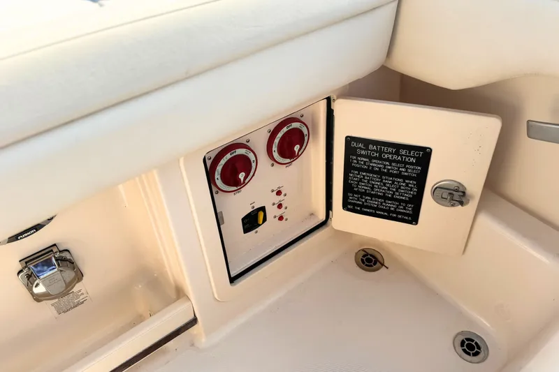 Slide: The Image of 2023 Grady-White Freedom 285 boat battery switch panel with dual operation controls. - 17
