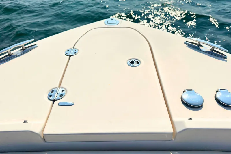 Slide: The Image of Bow of 2023 Grady-White Freedom 285 boat on sparkling water. - 44