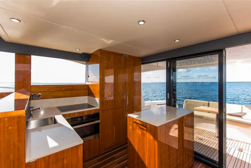 Slide: The Image of Luxurious interior of 2016 Maritimo M51 yacht with modern kitchen and ocean view. - 20